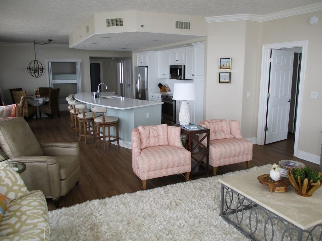 Living room, kitchen, and dining area